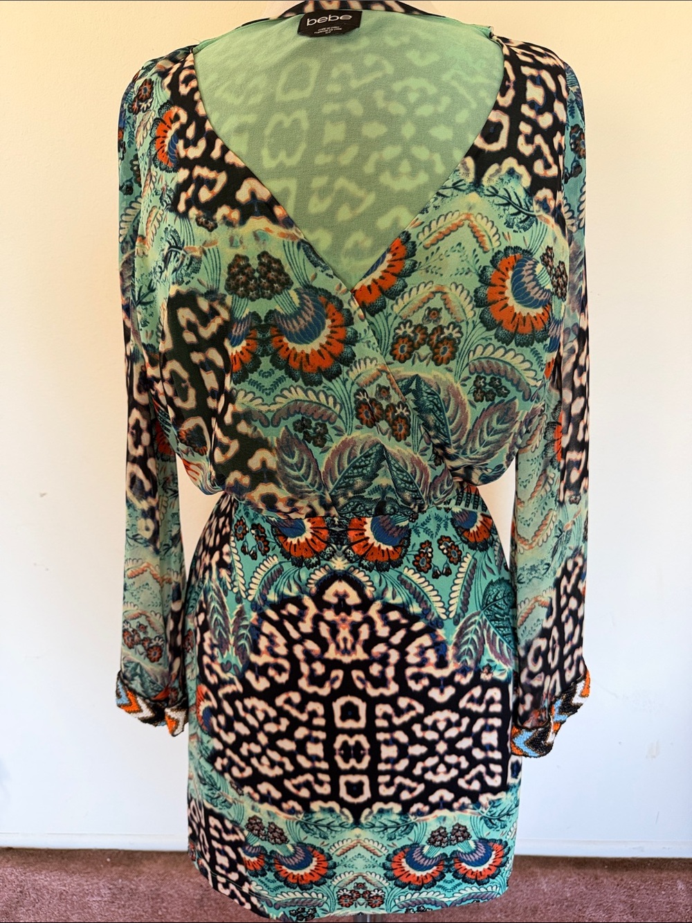 bebe Teal, Black & Orange Printed Wrap Dress with slits on sleeves and beading